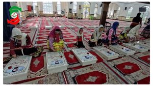 هنرمندان صنایع دستی آستانه اشرفیه گلزار شهدای شهرستان را گلباران کردند